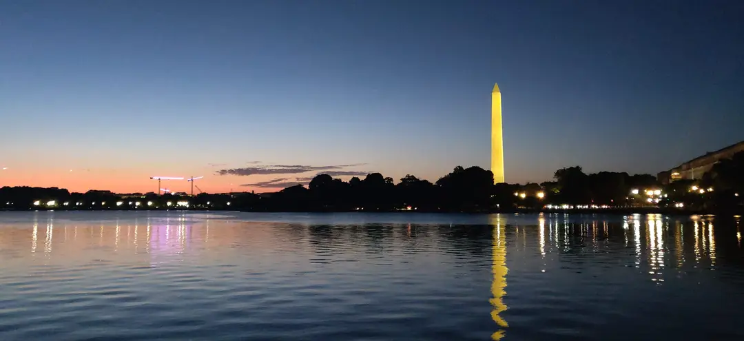 Washington Monument at dusk reflected in the Tidal Basin